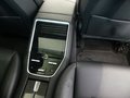 View of control buttons for electric rear seat adjustment