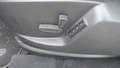 View of control buttons for electric seat adjustment