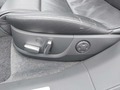 View of control buttons for electric rear seat adjustment