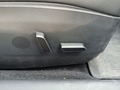 View of control buttons for electric seat adjustment