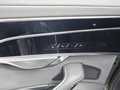 View of control buttons for electric rear seat adjustment
