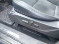 View of control buttons for electric seat adjustment