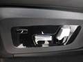 View of control buttons for electric rear seat adjustment
