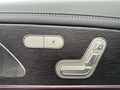 View of control buttons for electric rear seat adjustment