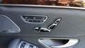View of control buttons for electric rear seat adjustment