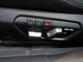 View of control buttons for electric seat adjustment