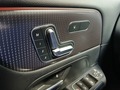 View of control buttons for electric seat adjustment