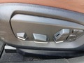 View of control buttons for electric seat adjustment