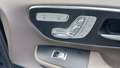 View of control buttons for electric rear seat adjustment