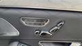View of control buttons for electric rear seat adjustment