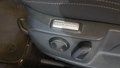 View of control buttons for electric seat adjustment