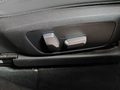 View of control buttons for electric seat adjustment