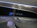 View of control buttons for electric rear seat adjustment