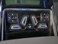 View of control buttons for electric rear seat adjustment