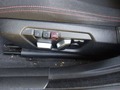 View of control buttons for electric seat adjustment