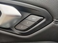 View of control buttons for electric seat adjustment