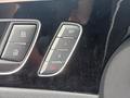 View of control buttons for electric seat adjustment