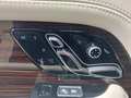 View of control buttons for electric rear seat adjustment