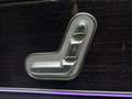 View of control buttons for electric rear seat adjustment
