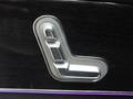 View of control buttons for electric rear seat adjustment