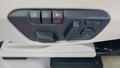 View of control buttons for electric seat adjustment