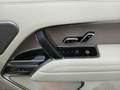 View of control buttons for electric rear seat adjustment