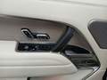 View of control buttons for electric rear seat adjustment