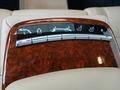 View of control buttons for electric rear seat adjustment
