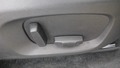 View of control buttons for electric seat adjustment