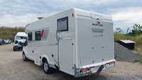 Вид сзади слева