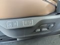 View of control buttons for electric rear seat adjustment