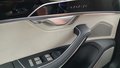 View of control buttons for electric rear seat adjustment