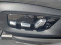 View of control buttons for electric seat adjustment