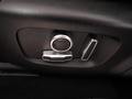 View of control buttons for electric seat adjustment