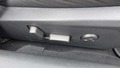 View of control buttons for electric seat adjustment