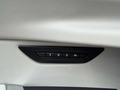 View of control buttons for electric seat adjustment