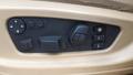 View of control buttons for electric seat adjustment