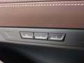View of control buttons for electric rear seat adjustment