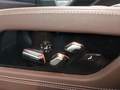 View of control buttons for electric rear seat adjustment