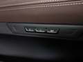 View of control buttons for electric rear seat adjustment