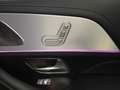 View of control buttons for electric rear seat adjustment