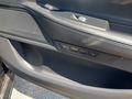 View of control buttons for electric seat adjustment