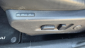 View of control buttons for electric seat adjustment
