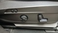 View of control buttons for electric seat adjustment