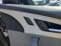 Vue des boutons de commande des sièges électriques