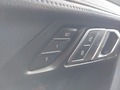 View of control buttons for electric seat adjustment