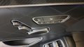 View of control buttons for electric rear seat adjustment