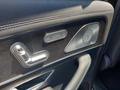 View of control buttons for electric rear seat adjustment