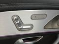 View of control buttons for electric rear seat adjustment