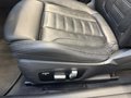 View of control buttons for electric seat adjustment